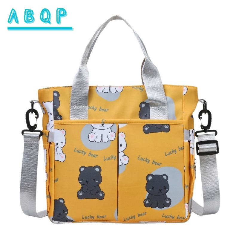 Baby Product Brand - ABQP ใหม่กระเป๋าผ้าอ้อมกระเป๋าถือแบรนด์หรูการ์ตูนกระเป๋าผ้าอ้อมเด็กกระเป๋าสะพายไหล่ความจุขนาดใหญ่แฟชั่นกระเป๋าเก็บผลิตภัณฑ์สำหรับเด็ก
